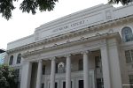 The photo shows the facade of the Supreme Court in Manila.